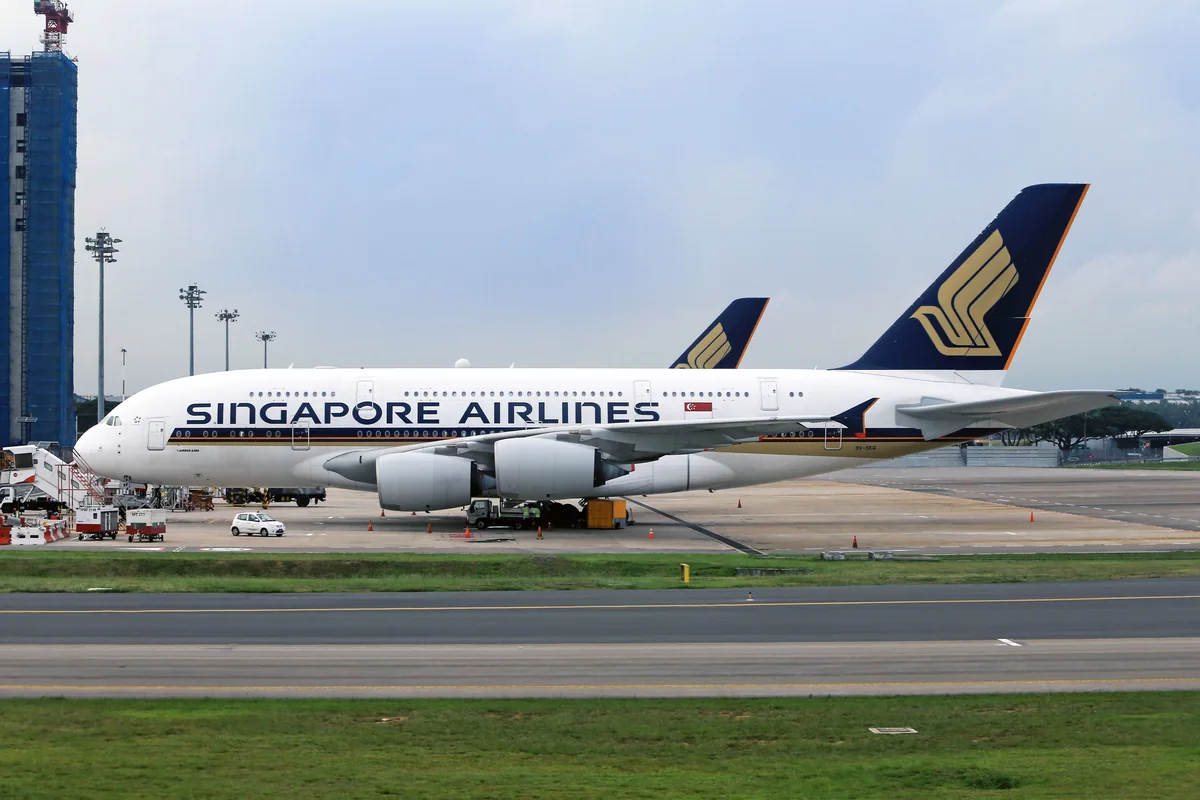 Singapore Airlines aircraft on an airport apron